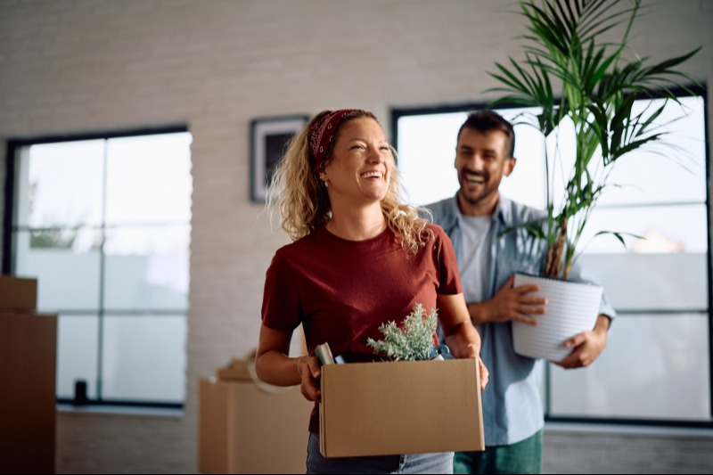 Couple with moving boxes